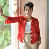 Discover Leher by The Sootee — a breezy Bandhani mulmul cotton shirt in deep red with white hand-tied motifs. Featuring 3/4th frill sleeves and a relaxed fit, this sustainable slow-fashion piece blends timeless craft with everyday chic, perfect for versatile styling.