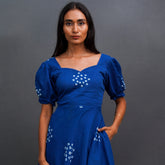 Meet Meher by The Sootee — a blue floral Bandhani cotton midi dress with a sweetheart neckline, puff sleeves, pockets, and flared hem. Hand-tied-and-dyed for slow-fashion lovers, this fully-lined artisan piece blends heritage craft with feminine everyday ease.