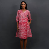Introducing Sangria by The Sootee — a vibrant red Shibori cotton wrap dress with a V-neckline, three-quarter sleeves, and side pockets. Hand-dyed and fully lined for comfort, this slow-fashion piece celebrates artisanal craft with effortless summer elegance and one-of-a-kind charm.