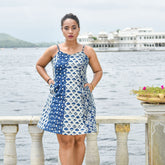 Discover Indie Tide by The Sootee — a panelled Indigo hand block print cotton dress crafted using four unique prints. With adjustable straps, pockets, and a breezy silhouette, this one-of-a-kind slow-fashion piece celebrates Indian craftsmanship with soulful elegance.