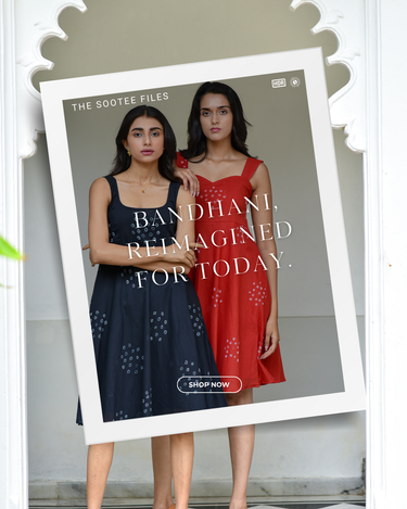 Two women wearing bandhani dresses with text overlay on a gray background