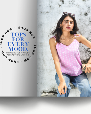 Woman wearing a pink polka dot top and blue jeans against a textured wall with promotional text.