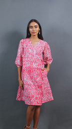 Introducing Sangria by The Sootee — a vibrant red Shibori cotton wrap dress with a V-neckline, three-quarter sleeves, and side pockets. Hand-dyed and fully lined for comfort, this slow-fashion piece celebrates artisanal craft with effortless summer elegance and one-of-a-kind charm.