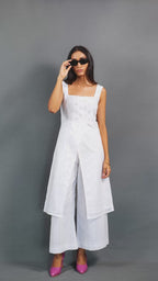 Embrace timeless elegance with Snowdrop by The Sootee — a handcrafted white Schiffli cotton co-ord set featuring floral cutwork, a sleeveless overlay top, and wide-legged pants. Versatile, breathable, and sustainably made, it’s perfect for slow-fashion lovers seeking effortless sophistication.